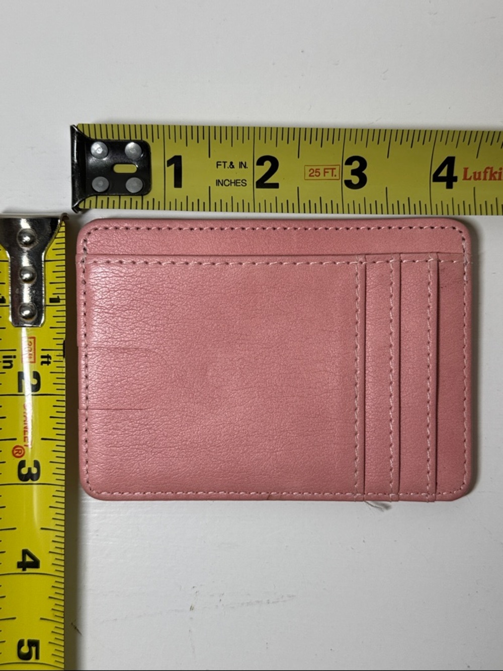Pink card case.